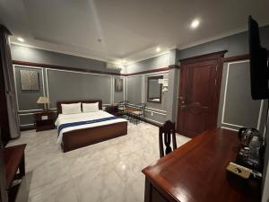 Voodi või voodid majutusasutuse LENA HOTEL toas
