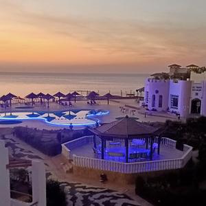 Uma vista da piscina em Halomy Sharm Resort ou nos arredores