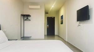 TV a/nebo společenská místnost v ubytování SiN LiEN HOTEL