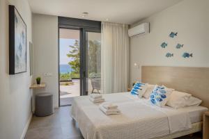 Giường trong phòng chung tại Villa Alina