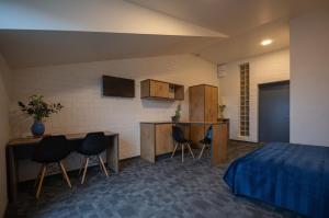 Kuchyň nebo kuchyňský kout v ubytování Loft Inn SELF-CHECK IN