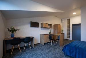 Kuchyň nebo kuchyňský kout v ubytování Loft Inn SELF-CHECK IN