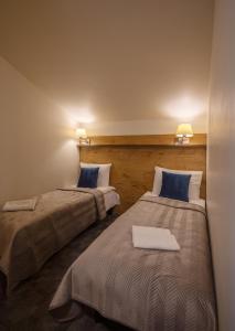 Postel nebo postele na pokoji v ubytování Loft Inn SELF-CHECK IN