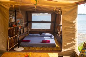 Letto o letti in una camera di Firefly Eco Retreat