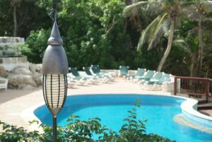 a resort swimming pool with aagonalagonalagonalagonalagonalagonalagonal at The Atlantis Historic Inn in Saint Joseph