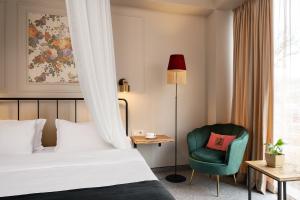 Postel nebo postele na pokoji v ubytování Galavani By Vintage Hotel Collections