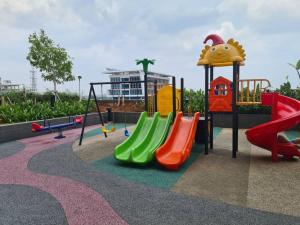 a playground with a slide at Urban Oasis Bekasi in Tambun-lobangbuaja
