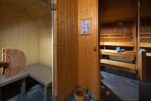Palanda nebo palandy na pokoji v ubytování Hotel-Gasthof Nutzkaser