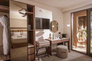 Кровать или кровати в номере Elounda Infinity Exclusive Resort & Spa - Adults Only