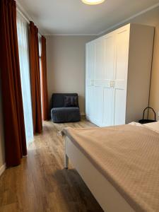 A bed or beds in a room at New apartment 6 - self check in, free parking