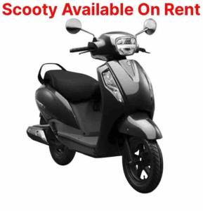 a scooter parked on a white background with the words scooter available on rent at Rukmani Villas Group of Rukmani home stay in Mathura