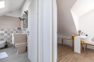 Koupelna v ubytování Villa Komelo