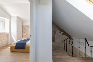 Postel nebo postele na pokoji v ubytování Villa Komelo