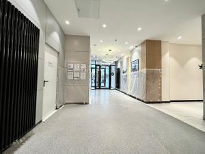 a hallway of a building with at RAISSON A-HOTELG32 KHAN SHATyR in Astana