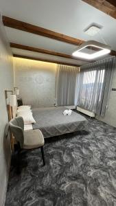 En eller flere senge i et værelse på Байка Карпат