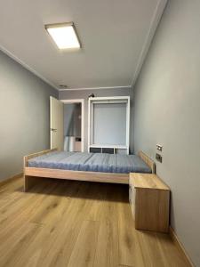 מיטה או מיטות בחדר ב-La morada de Crevillent