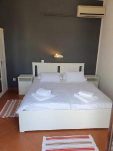 Postel nebo postele na pokoji v ubytování Apartman David
