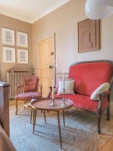 Posezení v ubytování Domaine Le Clos de la Source -Jacuzzi - Petit déjeuner buffet - Atelier d'art