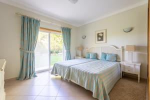 Ένα ή περισσότερα κρεβάτια σε δωμάτιο στο Lote 50 at Boavista Resort Lagos +36 φωτογραφίες