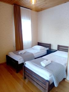 Letto o letti in una camera di STOP HOUSE Mestia