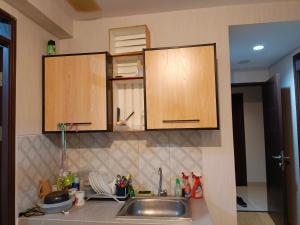Η κουζίνα ή μικρή κουζίνα στο Apartemen Syariah Bandung Banget