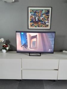 A television and/or entertainment centre at Uniclub House