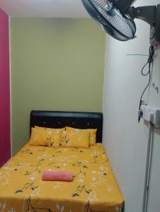 Katil atau katil-katil dalam bilik di Irman Homestay Pendang