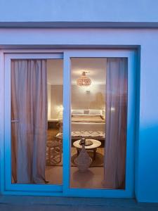 a window with a view of a room at Amazigh Home in Mirleft