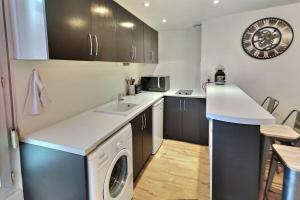 Kuchyň nebo kuchyňský kout v ubytování World studio proche gare et commerces ~ Mon Groom