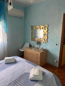 Säng eller sängar i ett rum på Valentinas Rent Apartment Casa Vacanze Alghero