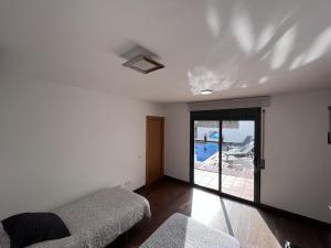 Posteľ alebo postele v izbe v ubytovaní R64 Deluxe Villa Déjà Vu