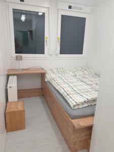 Postel nebo postele na pokoji v ubytování Gletscher-Trail Hostel