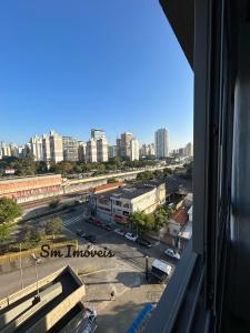 a view from a window of a parking lot at Apartamento ao Lado do metrô Carrão in Sao Paulo