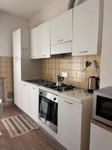 Η κουζίνα ή μικρή κουζίνα στο Casa Udine Charme 5 posti letto