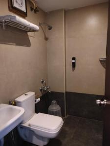 Et badeværelse på Astra Hotels & Suites - HSR Layout Sector 1, Near Ecospace Bellandur