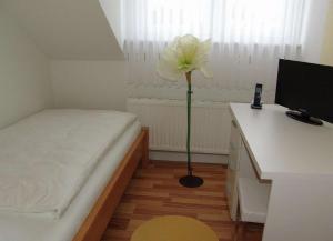 Postel nebo postele na pokoji v ubytování Venner Gasthaus
