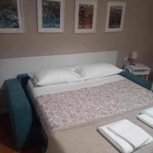 Cama o camas de una habitación en Appartamento Gradisca