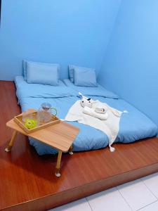 En eller flere senge i et værelse på C & L Home 001