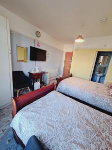 Thornbury Accommodation tesisinde bir odada yatak veya yataklar