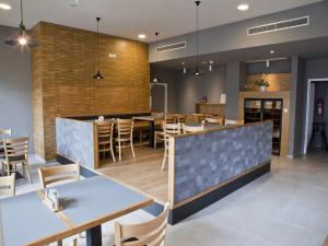 Reštaurácia alebo iné gastronomické zariadenie v ubytovaní EA Business Hotel Jihlava
