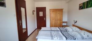 Postel nebo postele na pokoji v ubytování Chambre d'hôtes de la tulipe