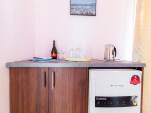 A kitchen or kitchenette at PORTO-FINO