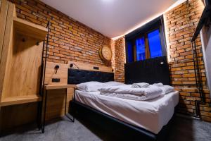 Posteľ alebo postele v izbe v ubytovaní Lord Jack Apartments