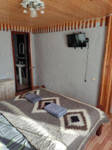 Postel nebo postele na pokoji v ubytování V Ulyanu