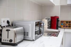 Køkken eller tekøkken på Splendide grand 3 pièces proche de Paris