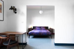 Postel nebo postele na pokoji v ubytování B&B Huis Billiet