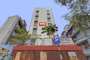 a yes sign in front of a tall building at Hotel Rajdoot Near Phoenix Palladium in Mumbai