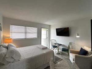 Katil atau katil-katil dalam bilik di Casey Key Beach Rentals