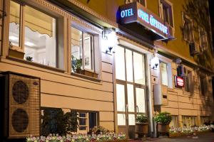 a building with a sign on the side of it at Topkapı Otel Özyavuz in Istanbul