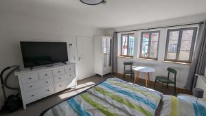 Postel nebo postele na pokoji v ubytování Gästezimmer Michelskeller